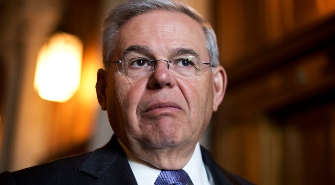 UNITED STATES - APRIL 21: Sen. Bob Menendez, D-N.J., talks with reporters before the senate policy luncheons on the Capitol, April 21, 2015. (Photo By Tom Williams/CQ Roll Call)