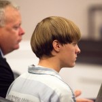 Dylann Roof (R), the 21-year-old man charged with murdering nine worshippers at a historic black church in Charleston last month, listens to the proceedings with assistant defense attorney William Maguire during a hearing at the Judicial Center in Charleston, South Carolina July 16, 2015.   REUTERS/Randall Hill