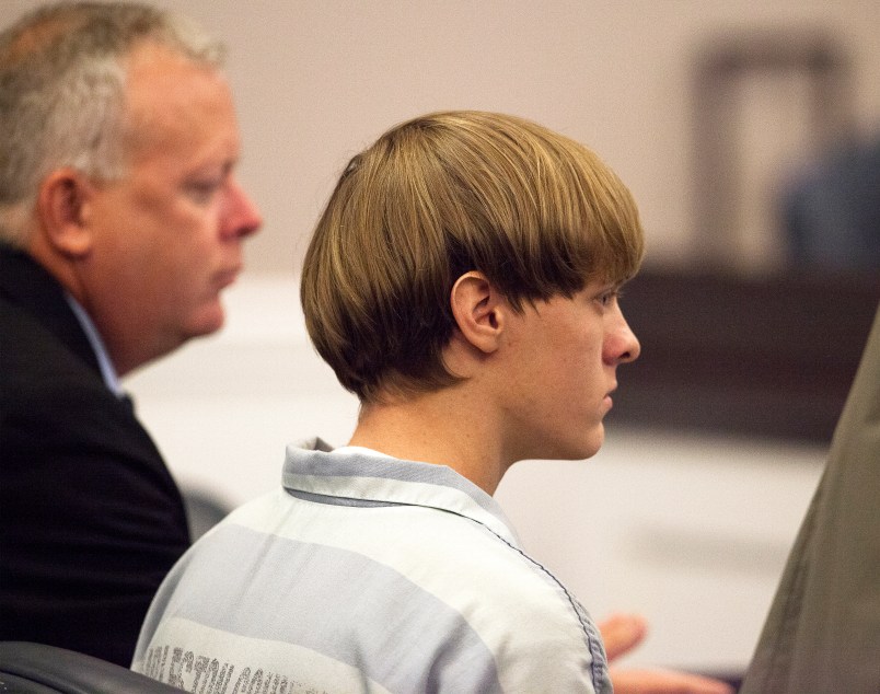 Dylann Roof (R), the 21-year-old man charged with murdering nine worshippers at a historic black church in Charleston last month, listens to the proceedings with assistant defense attorney William Maguire during a hearing at the Judicial Center in Charleston, South Carolina July 16, 2015.   REUTERS/Randall Hill
