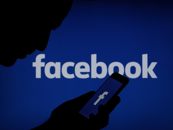 A Facebook logo is seen on a smartphone in this photo illustration on November 15, 2017. (Photo by Jaap Arriens/NurPhoto)