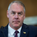 UNITED STATES - MARCH 13: Interior Secretary Ryan Zinke prepares to testify before a Senate Energy and Natural Resources Committee hearing in Dirksen Building on the department's FY2019 budget on March 13, 2018. (Photo By Tom Williams/CQ Roll Call)