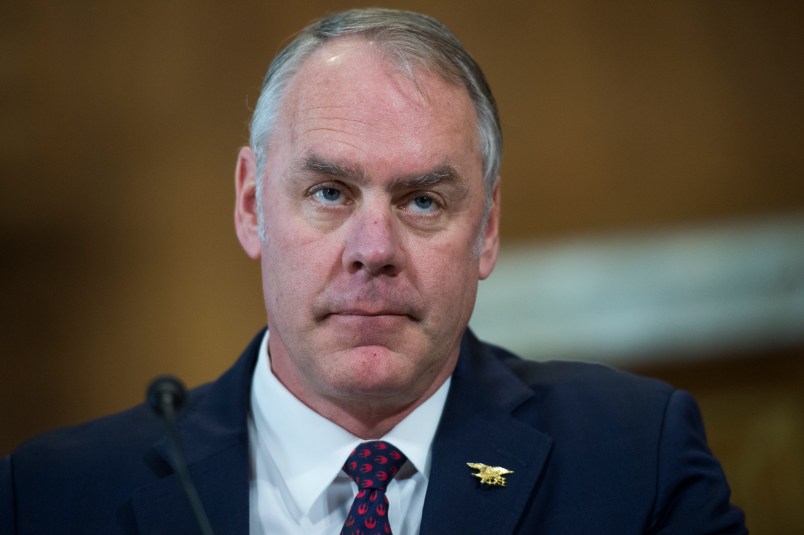 UNITED STATES - MARCH 13: Interior Secretary Ryan Zinke prepares to testify before a Senate Energy and Natural Resources Committee hearing in Dirksen Building on the department's FY2019 budget on March 13, 2018. (Photo By Tom Williams/CQ Roll Call)