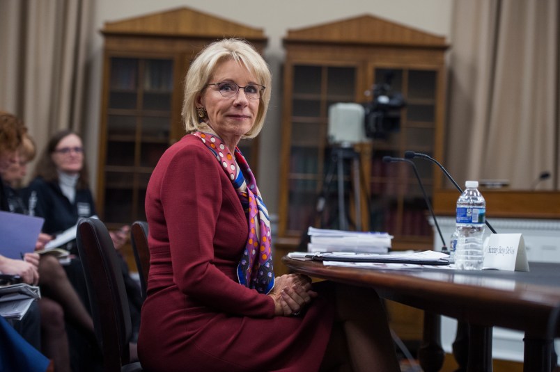 UNITED STATES - MARCH 20: Education Secretary Betsy DeVos prepares to testify at a House Appropriations Labor, Health and Human Services, Education and Related Agencies Subcommittee hearing in Rayburn Building on the department's FY2019 budget on March 20, 2018. (Photo By Tom Williams/CQ Roll Call)