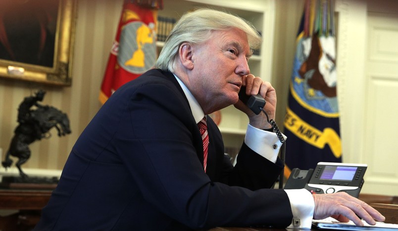 WASHINGTON, DC - JUNE 27:  U.S. President Donald Trump speaks on the phone with Irish Prime Minister Leo Varadkar on the phone in the Oval Office of the White House June 27, 2017 in Washington, DC. President Trump congratulated Prime Minister Varadkar to become the new leader of Ireland.  (Photo by Alex Wong/Getty Images)