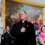 UNITED STATES - APRIL 11: Rev. Patrick Conroy, Chaplain of the House, attends the 2013 National Days of Remembrance ceremony in the Capitol rotunda to honor the victims of the Holocaust. (Photo By Tom Williams/CQ Roll Call)
