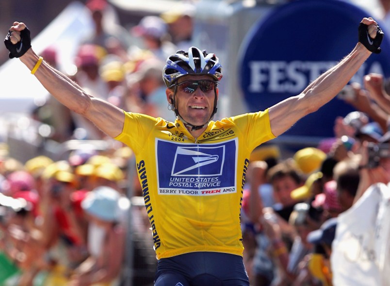 LE GRAND BORNAND, FRANCE - JULY 22:  Lance Armstrong of the USA and riding for US Postal Service presented by Berry Floor celebrates as he wins stage 17 of the Tour de France on July 22, 2004 from Bourg d'Oisans to le Grand Bornand, France. (Photo by Doug Pensinger/Getty Images) *** Local Caption *** Lance Armstrong