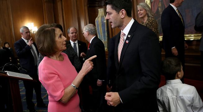 WASHINGTON, DC - DECEMBER 08:  U.S. Speaker of the House Paul Ryan (R) (R-WI) speaks with House Minority Leader Rep. Nancy Pelosi (D-CA) following an event marking the passage of the 21st Century Cures Act at the U.S. Capitol December 8, 2016 in Washington, DC. The bill, passed with strong bipartisan support, provides funding for cancer research, the fight against the epidemic of opioid abuse, mental health treatment, aids the Food and Drug Administration in expediting drug approvals and pushes for better use of technology in medicine.  (Photo by Win McNamee/Getty Images)
