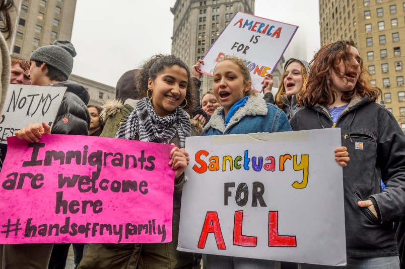 FOLEY SQUARE, NEW YORK, NY, UNITED STATES - 2017/02/07: High School and College students from across New York City walked out of classes at noon and congregated at Foley Square, united in opposition to the recent illegal executive order targeting Muslims and refugees, also known as the “Muslim Ban.”. (Photo by Erik Mcgregor/Pacific Press/LightRocket via Getty Images)