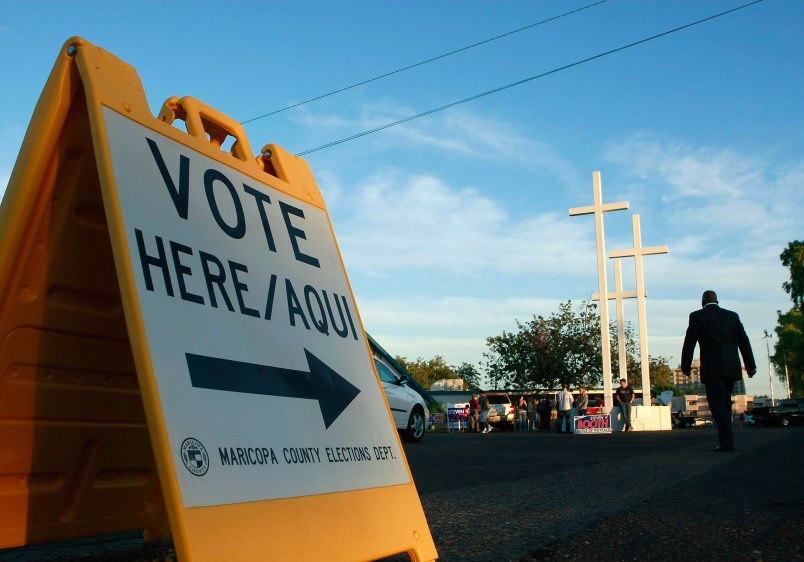 PHOENIX - NOVEMBER 4:  People arrive to vote at the Albright United Methodist Church November 4, 2008 in Phoenix, Arizona. Today millions of Americans will cast their vote for President of the United States.  (Photo by Mark Wilson/Getty Images)