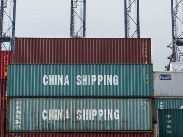 TSING YI ISLAND, CONTAINER TERMINAL, HONG KONG, NEW TERRITORIES - 2018/03/30: China Shipping containers seen at the Container terminal in Hong Kong.The Hong Kong Container Terminals is the sixth busiest container port in the world. It handled over 20 million TEUs in 2017. (Photo by Miguel Candela/SOPA Images/LightRocket via Getty Images)