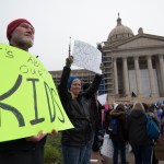 OKLAHOMA CITY, OK - APRIL 2:  Kent Scott, a teacher from Tecumseh, Okla. holds a protest sign at the state capitol in Oklahoma City, Oklahoma on April 2, 2018. Thousands of teachers and supporters are scheduled to rally Monday at the state Capitol as Oklahoma becomes the latest state to be plagued by teacher strife. Teachers are walking off the job after a $6,100 pay raise was rushed through the Legislature and signed into law by Gov. Mary Fallin. (Photo by J Pat Carter/Getty Images)
