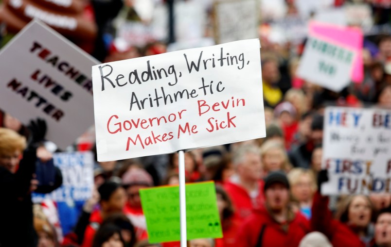 FRANKFORT, KY-APRIL 2: Thousands of public school teachers and their supporters protest against a pension reform bill at the Kentucky State Capital April 2, 2018 in Frankfort, Kentucky. The teachers are calling for higher wages and are demanding that Kentucky Gov. Matt Bevin veto a bill that overhauls their pension plan. (Bill Pugliano/Getty Images)