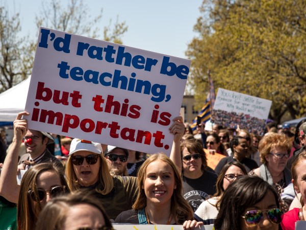 OKLAHOMA CITY, OK - APRIL 04: Thousands gathered and marched in a pitcket line outside the Oklahoma state Capitol building during the third day of a statewide education walkout on April 4, 2018 in Oklahoma City, Oklahoma. Teachers and their supporters are demanding increased school funding and pay raises for school workers. (Photo by Scott Heins/Getty Images)