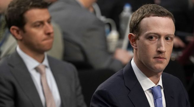 WASHINGTON, DC - APRIL 10:  Facebook co-founder, Chairman and CEO Mark Zuckerberg testifies before a combined Senate Judiciary and Commerce committee hearing in the Hart Senate Office Building on Capitol Hill April 10, 2018 in Washington, DC. Zuckerberg, 33, was called to testify after it was reported that 87 million Facebook users had their personal information harvested by Cambridge Analytica, a British political consulting firm linked to the Trump campaign.  (Photo by Alex Wong/Getty Images)