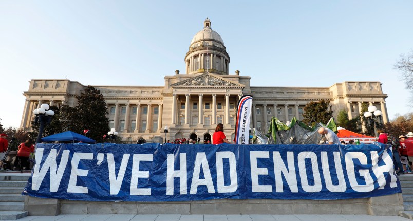 FRANKFORT, KY-APRIL 13: Kentucky Public school teachers rally for a "day of action" at the Kentucky State Capitol to try to pressure legislators to override Kentucky Governor Matt Bevin's recent veto of the state's tax and budget bills April 13, 2018 in Frankfort, Kentucky. The teachers also oppose a controversial pension reform bill which Gov. Bevin signed into law. (Bill Pugliano/Getty Images)