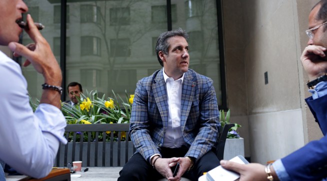 NEW YORK, NY - APRIL 13: Michael Cohen, President Donald Trump's attorney, chats with friends near the Loews Regency hotel on Park Ave on April 13, 2018 in New York City. Following FBI raids on his home, office and hotel room, the Department of Justice announced that they are placing him under criminal investigation. (Photo by Yana Paskova/Getty Images)