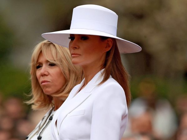 WASHINGTON, DC - APRIL 24:  U.S. first lady Melania Trump and Brigitte Macron take part in a state arrival ceremony at the White House April 24, 2018 in Washington, DC. French President Emmanuel Macron and U.S. President Donald Trump are scheduled to meet throughout the day to discuss a range of bilateral issues as Trump holds his first official state visit with the French president.  (Photo by Chip Somodevilla/Getty Images)