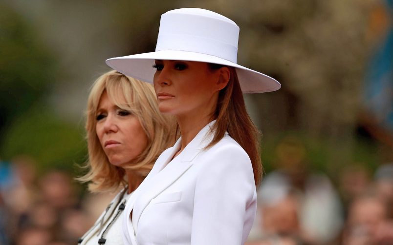 WASHINGTON, DC - APRIL 24:  U.S. first lady Melania Trump and Brigitte Macron take part in a state arrival ceremony at the White House April 24, 2018 in Washington, DC. French President Emmanuel Macron and U.S. President Donald Trump are scheduled to meet throughout the day to discuss a range of bilateral issues as Trump holds his first official state visit with the French president.  (Photo by Chip Somodevilla/Getty Images)