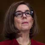 UNITED STATES - MARCH 08: Gov. Kate Brown, D-Ore.,  prepares to testify during a Senate Health, Education, Labor, and Pensions Committee hearing in Dirksen Building titled "The Opioid Crisis: Leadership and Innovation," on March 08, 2018. (Photo By Tom Williams/CQ Roll Call)