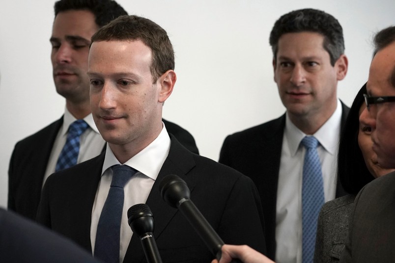 WASHINGTON, DC - APRIL 09:  Facebook CEO Mark Zuckerberg (2nd L) arrives at a meeting with U.S. Sen. Bill Nelson (D-FL), ranking member of the Senate Committee on Commerce, Science, and Transportation, April 9, 2018 on Capitol Hill in Washington, DC. Zuckerberg is scheduled to testify before a few Congressional committees this week on the mass usersÕ data Facebook has shared with political operatives.  (Photo by Alex Wong/Getty Images)