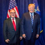 **HOLD FOR STORY TO MOVE OVERNIGHT. WDC WILL ADVISE TIMING** This photo acquired by The Associated Press is copied from a leaked email sent by Elliott Broidy and shows George Nader posing for a photo with President Donald Trump back stage at an RNC fund raiser in Dallas on Oct. 25, 2017. (AP Photo)