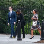 Kim Kardashian, center, arrives at the security entrance of the White House in Washington, Wednesday, May 30, 2018. (AP Photo/Pablo Martinez Monsivais)