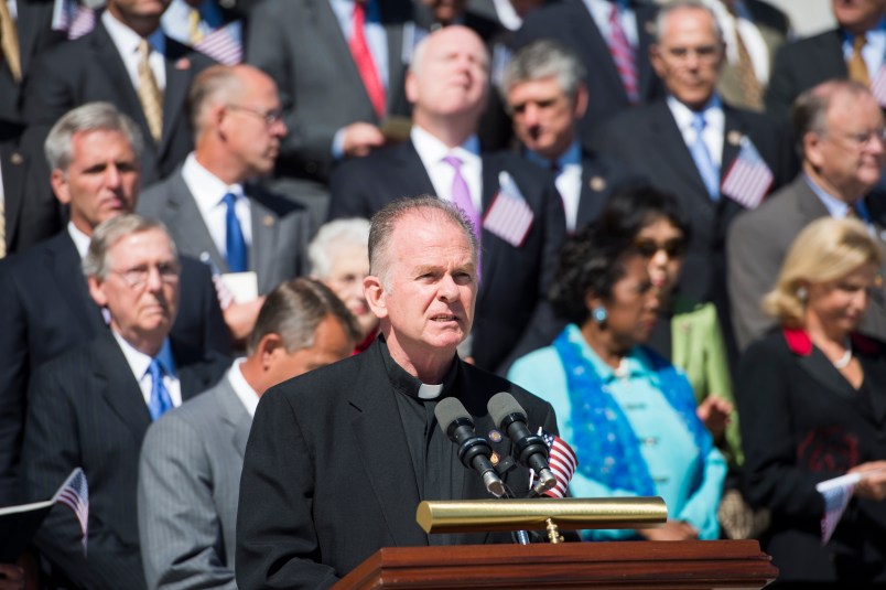 UNITED STATES - SEPTEMBER 11: Reverend Patrick J. Conroy,Chaplain of the U.S. House of Representatives, speaks on the East Front steps of the Capitol during the 9/11 Congressional Remembrance Ceremony on Tuesday, Sept. 11, 2012. (Photo By Bill Clark/CQ Roll Call)