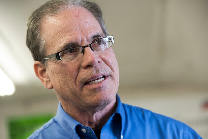 UNITED STATES - APRIL 4: Mike Braun, center, who is running for the Republican nomination for Senate in Indiana, attends the Kosciusko County Republican Fish Fry in Warsaw, Ind., on April 4, 2018. (Photo By Tom Williams/CQ Roll Call)