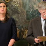 White House Press Secretary Sarah Huckabee Sanders (L) and National Security Advisor John Bolton listen to remarks by President Donald Trump as he speaks to the nation, announcing military action against Syria for the recent gas attack on civilians, at the White House, April 13, 2018, in Washington, DC.        ISP POOL Photo by Mike Theiler/UPI