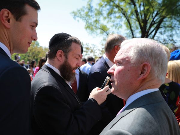 U.S. President Donald Trump signs an executive order during an event in the Rose Garden to mark the National Day of Prayer at the White House May 3, 2018 in Washington, DC. The White House invited leaders from varios faiths and religions to participate in the day of prayer, which was designated in 1952 by the United States Congress to ask people "to turn to God in prayer and meditation."