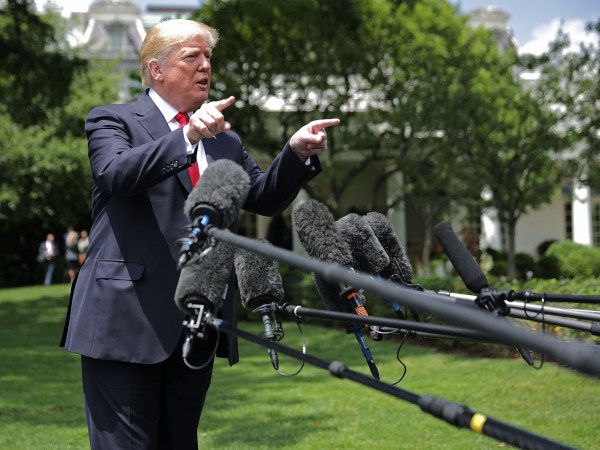 U.S. President Donald Trump talks to journalists before departing the White House May 23, 2018 in Washington, DC. Trump is traveling to New York where he will tour theÊMorrelly Homeland Security Center and then attend aÊroundtable discussion and dinner with supporters before returning to Washington.Ê