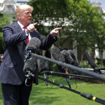 U.S. President Donald Trump talks to journalists before departing the White House May 23, 2018 in Washington, DC. Trump is traveling to New York where he will tour theÊMorrelly Homeland Security Center and then attend aÊroundtable discussion and dinner with supporters before returning to Washington.Ê