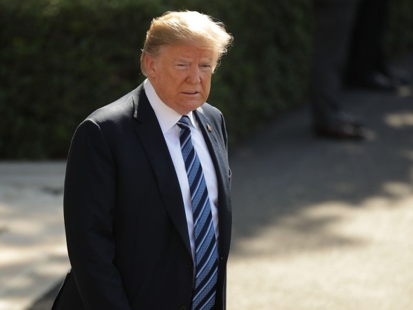 U.S. President Donald Trump talks to members of the news media before departing the White House May 25, 2018 in Washington, DC. Trump is traveling to Annapolis, Maryland, to participate in the Naval Academy's graduation ceremony.