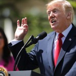 U.S. President Donald Trump signs an executive order during an event in the Rose Garden to mark the National Day of Prayer at the White House May 3, 2018 in Washington, DC. The White House invited leaders from varios faiths and religions to participate in the day of prayer, which was designated in 1952 by the United States Congress to ask people "to turn to God in prayer and meditation."