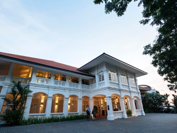 The facade of the Capella hotel on Sentosa island is seen at dusk in Singapore, Tuesday, June 5, 2018. The hotel is touted as a possible venue for the upcoming Trump-Kim summit, which will be held on June 12. (AP Photo/Yong Teck Lim)