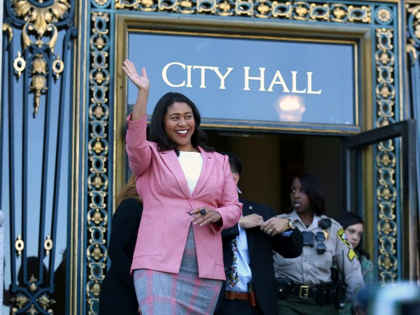 London Breed waves before speaking to reporters outside of City Hall in San Francisco, Wednesday, June 13, 2018. Breed was poised to become the first African-American woman to lead San Francisco following a hard-fought campaign when former state senator Mark Leno conceded and congratulated her Wednesday, more than a week after the election. (AP Photo/Lorin Eleni Gill)