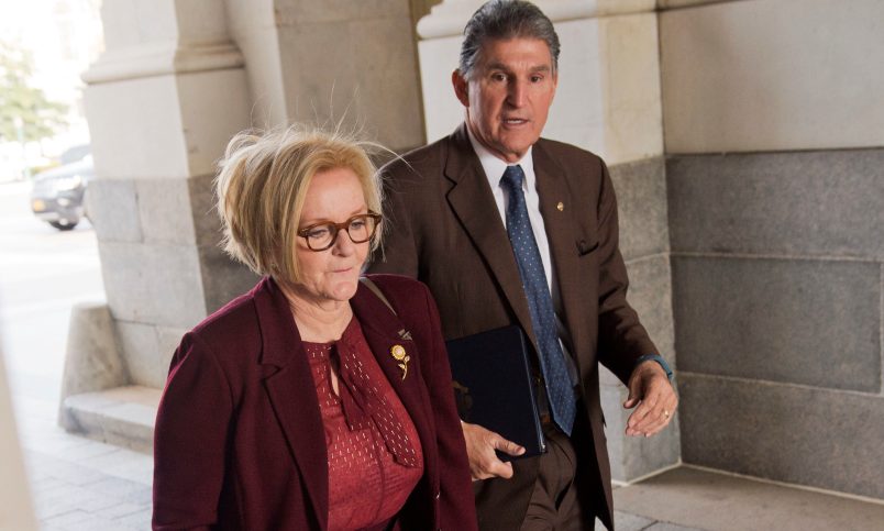 UNITED STATES - DECEMBER 13: Sen. Claire McCaskill, D-Mo., and Joe Manchin, D-W.Va., arrives to the Senate carriage entrance of the Capitol for votes on Saturday, December 13, 2014. (Photo By Tom Williams/CQ Roll Call)