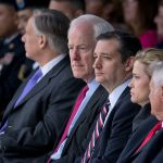 U.S. Senators John Cornyn, l, and Ted Cruz of Texas pause as dozens of Purple Hearts and two Defense of Freedom Medals were awarded at Fort Hood, Texas to victims and family of the 2009 terrorist attack.   Maj. Nadal Hasan is on death row for the attack that claimed 12 lives and wounded dozens.