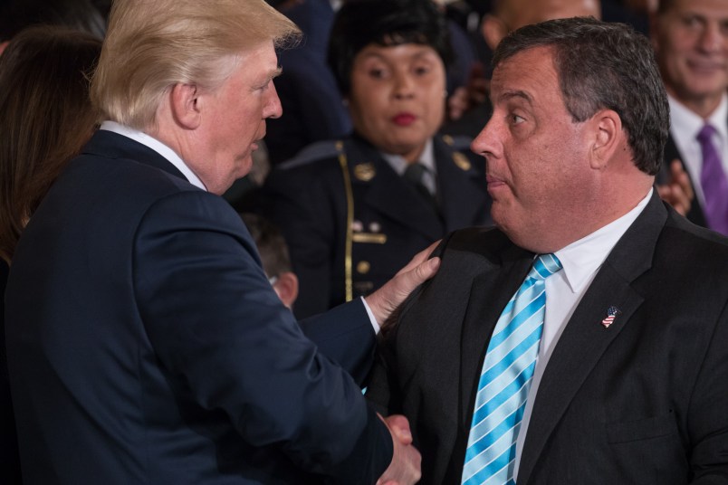 President Donald Trump shakes hands with Chris Christie, governor of New Jersey, after he signed the presidential memorandum addressing the opioid crisis, in the East Room of the White House, on Thursday October 26th, 2017. (Photo by Cheriss May/NurPhoto)