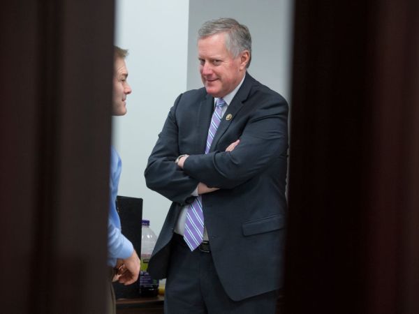 UNITED STATES - MARCH 06: Rep. Mark Meadows, R-N.C., right, talks with Rep. Jim Jordan, R-Ohio, in the Capitol after a meeting of the House Republican Conference on March 06, 2018. (Photo By Tom Williams/CQ Roll Call)