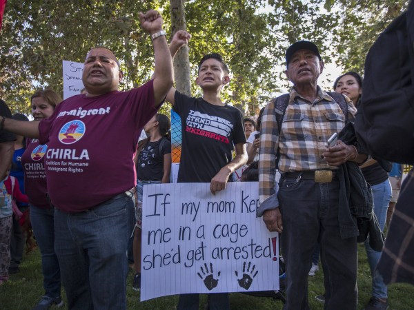 LOS ANGELES, CA - JUNE 14: People protest the Trump administration policy of removing children from parents arrested for illegally crossing the U.S.-Mexico border on June 14, 2018 in Los Angeles, California. Demonstrators marched through the city and culminated the march at a detention center where ICE (U.S.Immigration and Customs Enforcement) detainees are held. U.S. Immigration and Customs Enforcement recently arrested 162 undocumented immigrants during a three-day operation in Los Angeles and surrounding areas.  (Photo by David McNew/Getty Images)