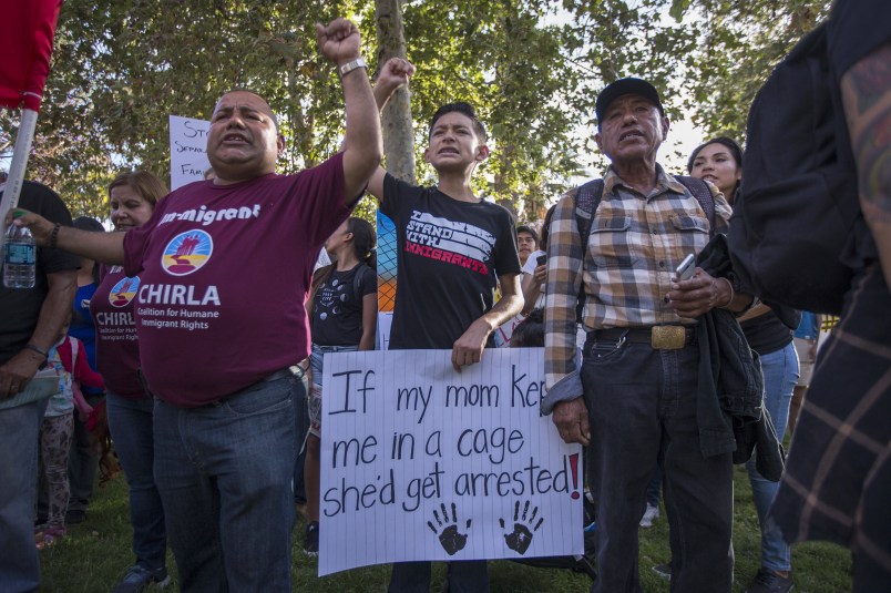 LOS ANGELES, CA - JUNE 14: People protest the Trump administration policy of removing children from parents arrested for illegally crossing the U.S.-Mexico border on June 14, 2018 in Los Angeles, California. Demonstrators marched through the city and culminated the march at a detention center where ICE (U.S.Immigration and Customs Enforcement) detainees are held. U.S. Immigration and Customs Enforcement recently arrested 162 undocumented immigrants during a three-day operation in Los Angeles and surrounding areas.  (Photo by David McNew/Getty Images)