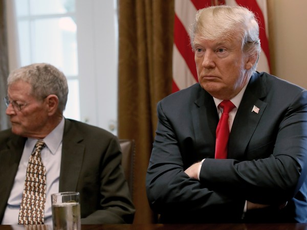 WASHINGTON, DC - JUNE 20:  U.S. President Donald Trump (R) meets with members of the U.S. Congress on immigration in the Cabinet Room of the White House June 20, 2018 in Washington, DC. Trump said he would sign an executive order later today relating to the issue of immigrant children being separated from their parents while being detained. Also pictured is Sen. James Inhofe (L) (R-OK). (Photo by Win McNamee/Getty Images)