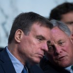 UNITED STATES - JUNE 20: Chairman Richard Burr, R-N.C., right, and Vice Chairman Mark Warner, D-Va., conduct a Senate (Select) Intelligence Committee hearing in Hart Building titled “Policy Response to Russian Interference in the 2016 U.S. Elections,” on June 20, 2018. Michael Daniel, former White House Cybersecurity Coordinator and Special Assistant to President Obama, and Amb. Victoria Nuland, former Assistant Secretary of State for European and Eurasian Affairs, testified. (Photo By Tom Williams/CQ Roll Call)