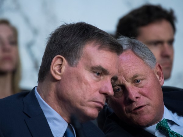 UNITED STATES - JUNE 20: Chairman Richard Burr, R-N.C., right, and Vice Chairman Mark Warner, D-Va., conduct a Senate (Select) Intelligence Committee hearing in Hart Building titled “Policy Response to Russian Interference in the 2016 U.S. Elections,” on June 20, 2018. Michael Daniel, former White House Cybersecurity Coordinator and Special Assistant to President Obama, and Amb. Victoria Nuland, former Assistant Secretary of State for European and Eurasian Affairs, testified. (Photo By Tom Williams/CQ Roll Call)