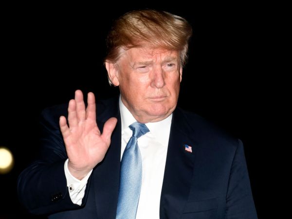 President Donald Trump waves to the press on his arrival at the White House, Washington, DC, after a day trip to Las Vegas, Nevada, June 23, 2018. Trump met with supporters and delivered remarks to the Nevada Republican Party.     ISP POOL Photo by Mike Theiler/UPI