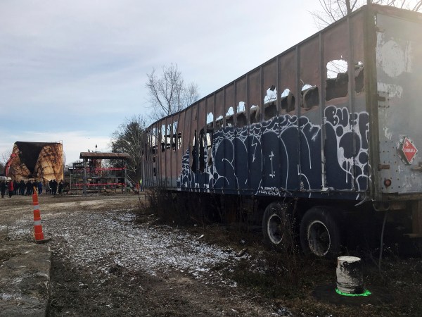 **HOLD FOR STORY BY BRIAN SLODYSKO**Residents of an Indianapolis neighborhood cheered December 11, 2017, when a massive storage tank at a Kiel Bros. facility was torn down. Kiel Bros. sold the site in 2005 for $10 and neighbors say it’s been an eyesore ever since. (AP Photo/Brian Slodysko)