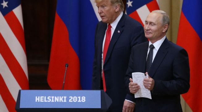 HELSINKI, FINLAND - JULY,16 (RUSSIA OUT) U.S.President Donald Trump (L) and  Russian President Vladimir Putin (R) enter the hall during their joint press conference in Helsinki, Finland, July,16,2018. Russian and U.S. Presidents have arrived to Helsinki for the summit. (Photo by Mikhail Svetlov/Getty Images)