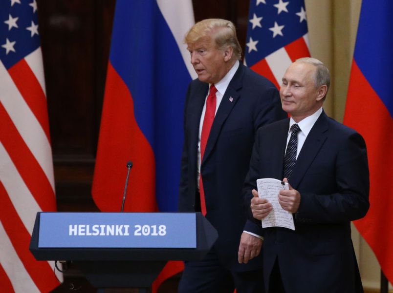HELSINKI, FINLAND - JULY,16 (RUSSIA OUT) U.S.President Donald Trump (L) and  Russian President Vladimir Putin (R) enter the hall during their joint press conference in Helsinki, Finland, July,16,2018. Russian and U.S. Presidents have arrived to Helsinki for the summit. (Photo by Mikhail Svetlov/Getty Images)