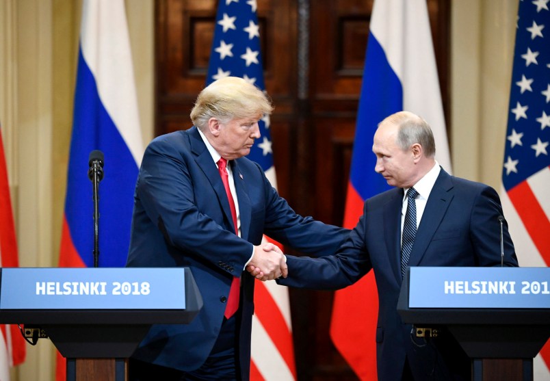BEIJING, July 17, 2018  -- U.S. President Donald Trump (L) shakes hands with Russian President Vladimir Putin during a joint press conference in Helsinki, Finland, on July 16, 2018. (Xinhua/Lehtikuva/Jussi Nukari)